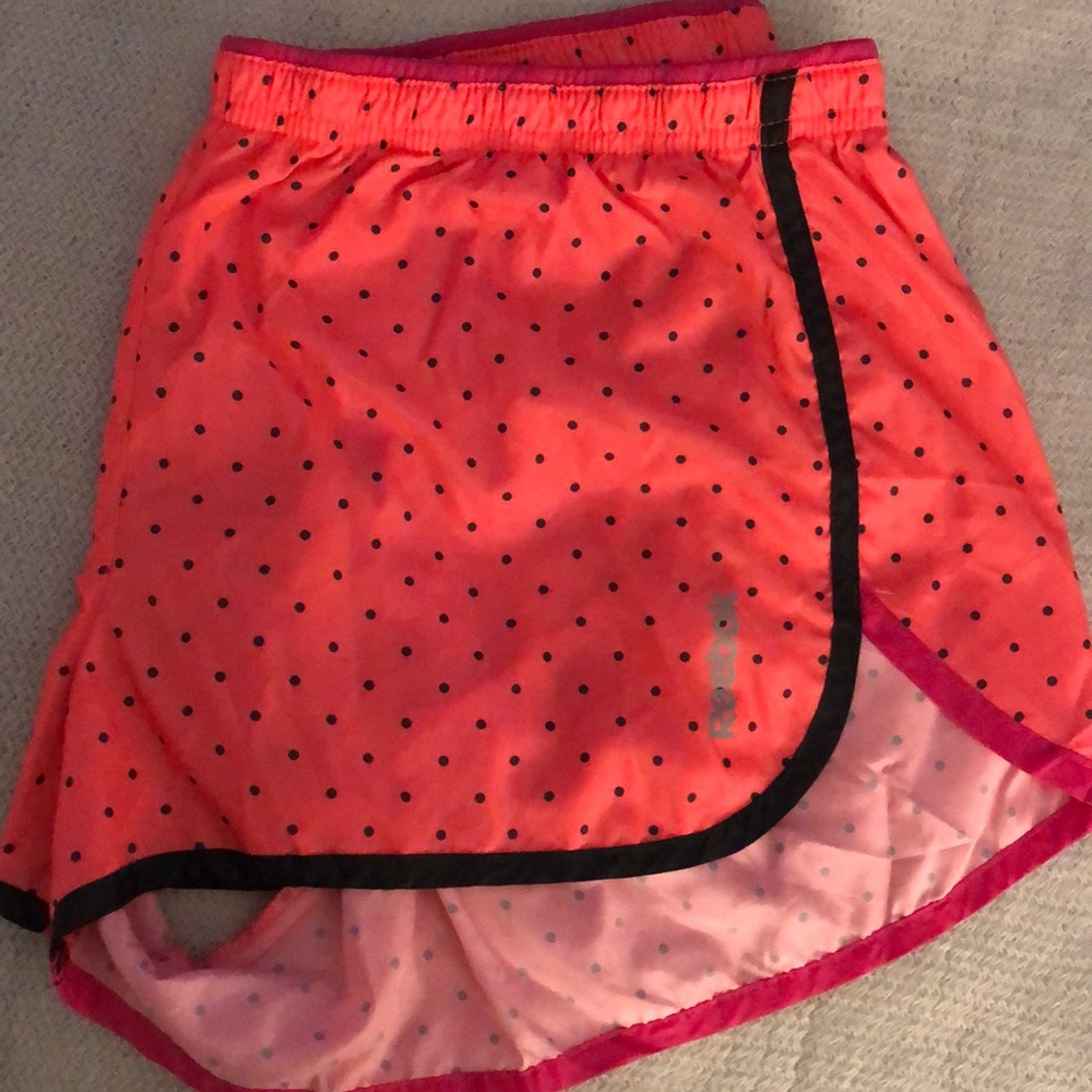 Reebok reflective peach shorts